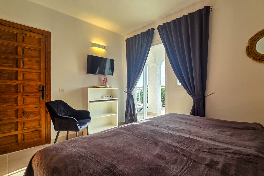 The master bedroom opens onto the terrace.