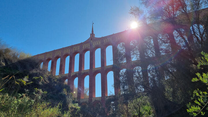 Brick aqueduct del Águila near Nerja with gorge in the foreground